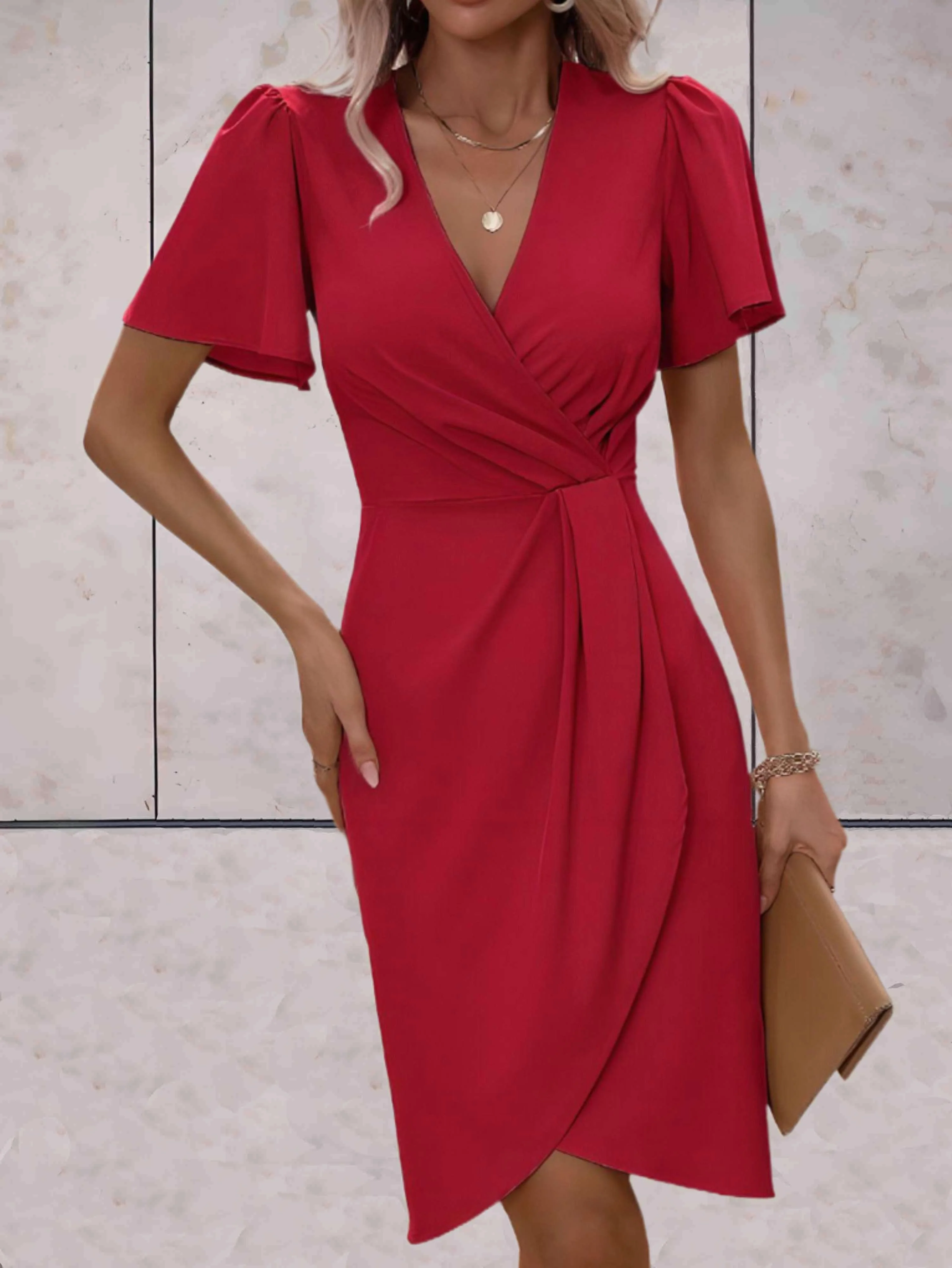 elegante wikkeljurk met korte mouwen